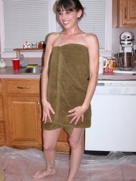 Petite Samantha Charles gets all messy playing with food in the kitchen