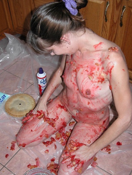 Petite Samantha Charles gets all messy playing with food in the kitchen