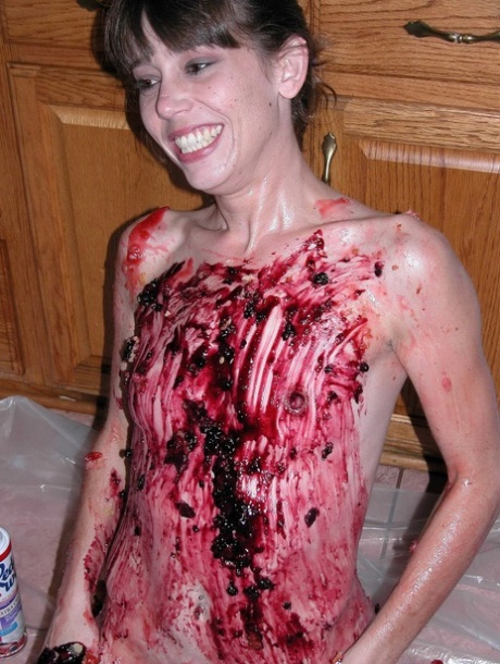 Petite Samantha Charles gets all messy playing with food in the kitchen