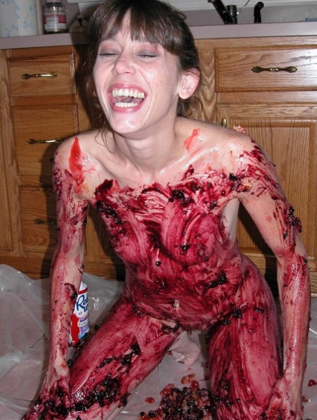 Petite Samantha Charles gets all messy playing with food in the kitchen