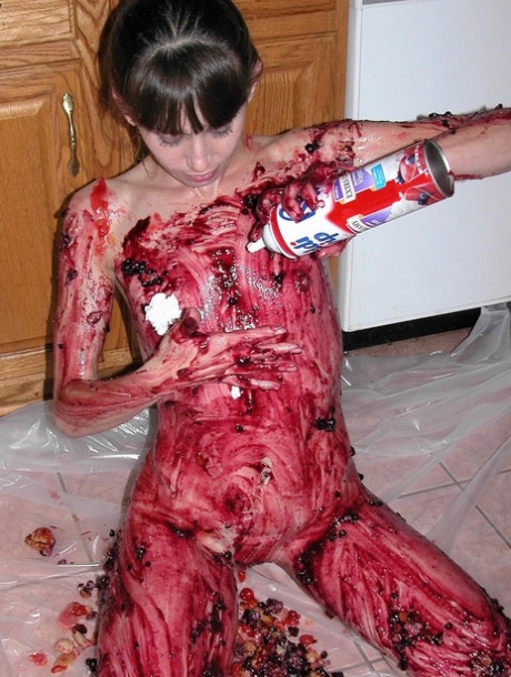 Petite Samantha Charles gets all messy playing with food in the kitchen