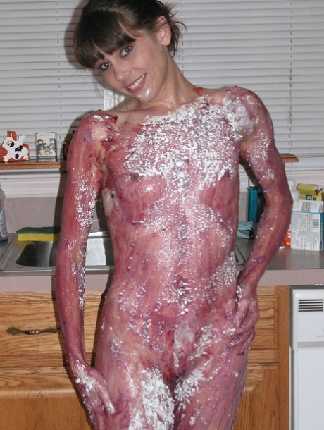 Petite Samantha Charles gets all messy playing with food in the kitchen