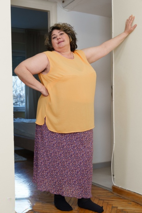 Hot teen Emily F and fat granny Edina pose in their living room