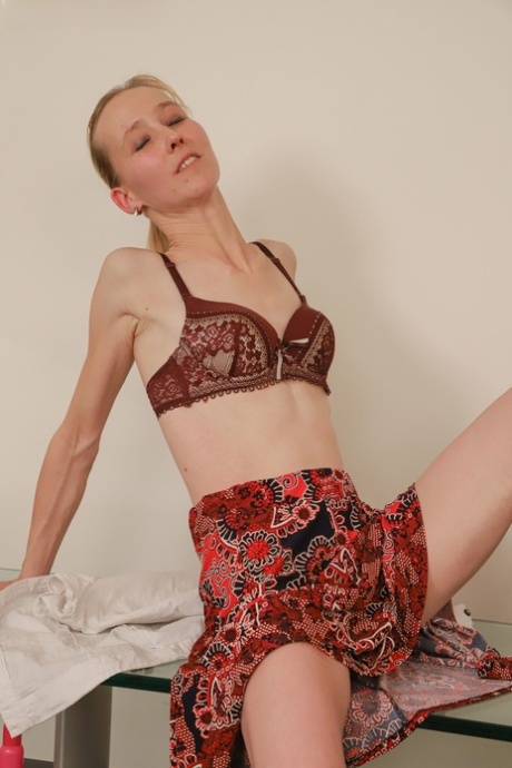 Skinny amateur MILF Lucia Blava undresses and masturbates in a solo