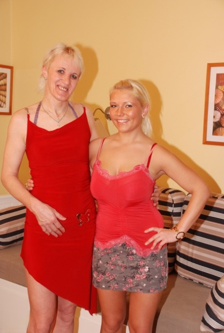 Horny blonde matures Ellen J and Juliette A undress and play with a strapon