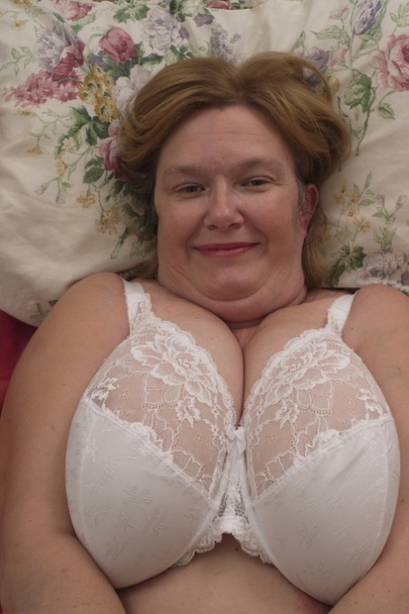 BBW woman in glasses Busty GG sucks her huge naturals and toys her pussy